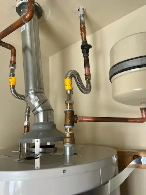 Water heater installation and plumbing repair in Vermillion